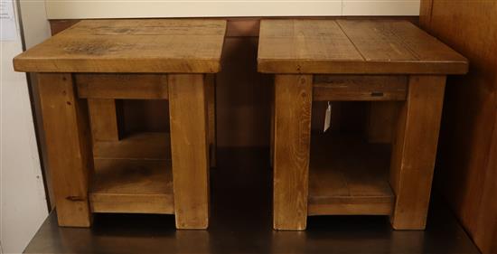 A pair of modern oak two tier occasional tables W.50cm